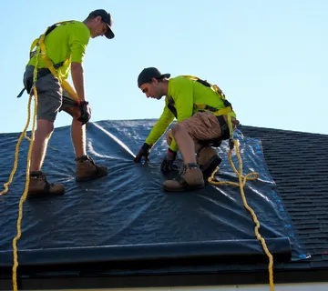 Emergency roof tarping